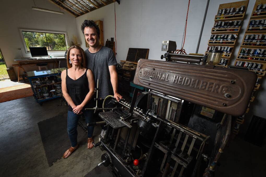 PASSION FOR PRINT: Danika and Doug Aplin in their tastefully refurbished shed space that houses their bespoke stationery business D@D Letterpress. Picture: MARK JESSER