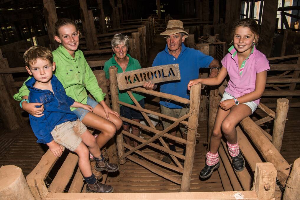 LASTING LEGACY: Jennifer and John McFarlane (above centre) with grandchildren Harvey, Anastasia and Sienna at the old Urangeline woolshed (built in 1864) owned by Robert Rand.