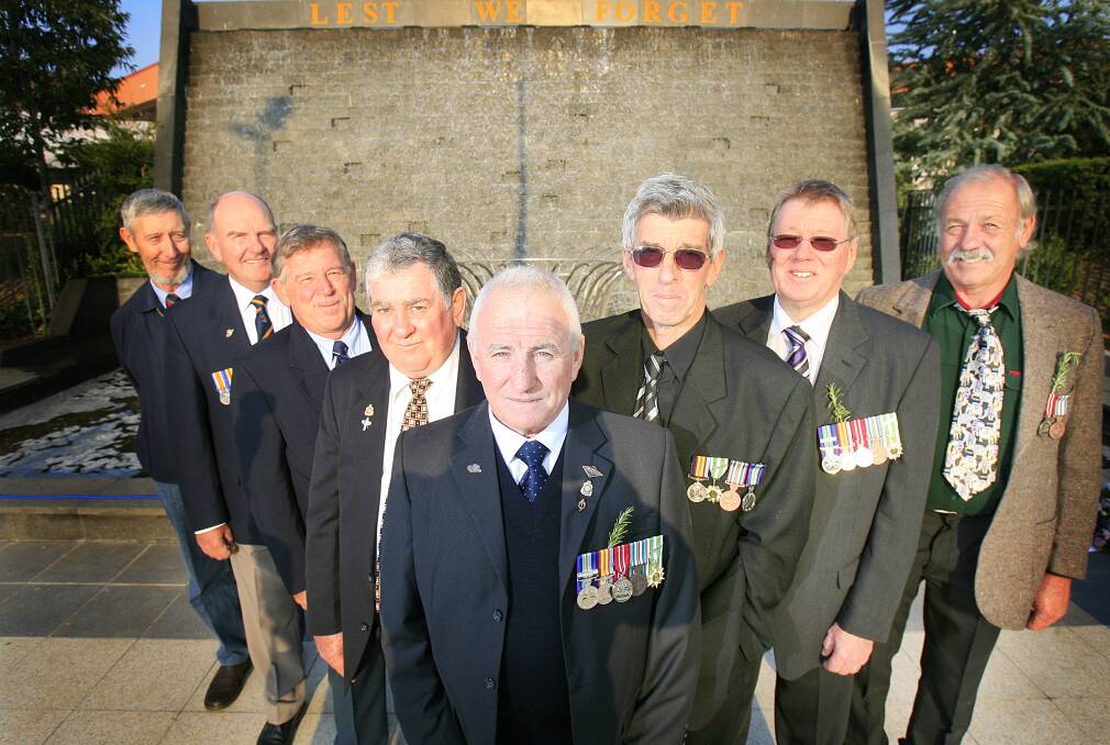 LIFELONG MATES: Vietnam vets Eric Michael, Murray McCooke, Dave Parker, Ron Hulm, Michael O'Callaghan, Tom Henderson, Rob O'Sullivan and Jack Davies met at the Albury Railway Station in 1968 ahead of rookie training at Kapooka. This picture was taken by The Border Mail for their 40th reunion in 2008.