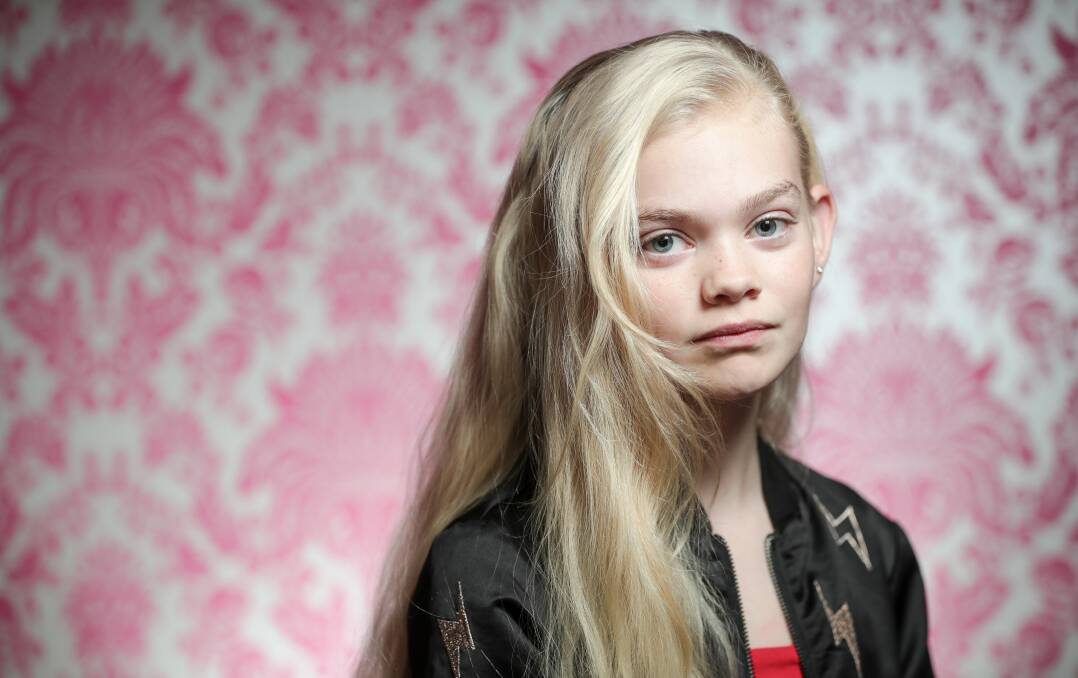 BUBBLEGUM KID: Penny McEachern, 13, has been signed by Australia's longest-running child modelling agency. Picture: JAMES WILTSHIRE