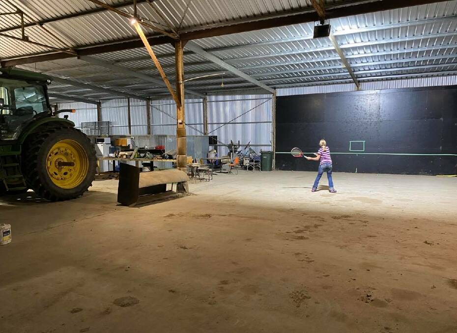 CREATIVE: Indi Paton practising in the Morven property's farm machinery shed in the inclement winter weather.