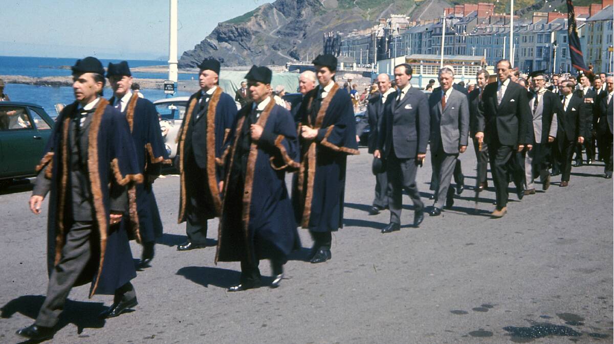 Mr Jones (fifth from front) in his his robes during a stint on the council of his home town at Aberystwyth, Wales, in 1968, where the-then Prince Charles studied Welsh.
