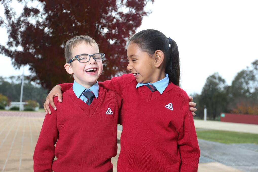 THE CHILDREN ARE OUR FUTURE: Trinity Anglican College Thurgoona Year 2 students Mitch Schibert, 7, and Nayamat Sandhu, 7. Picture: TARA TREWHELLA