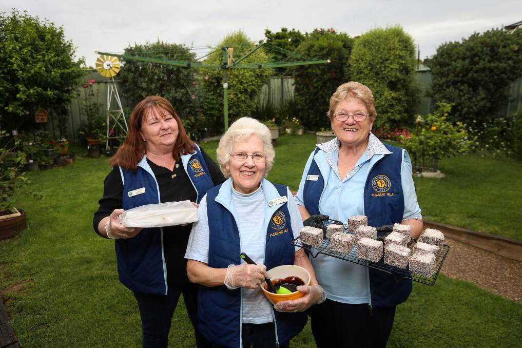 THERE TO CARE: Pleasant Hills CWA members Lynette Maloney, Lyn Jacobsen and Bev Frohling have kept on with their fundraising endeavours through COVID-19. Pictures: JAMES WILTSHIRE