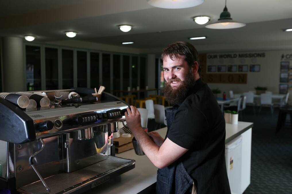 COFFEE KING: Liam Knight is developing his skills as a barista through the Purple Chicken cafe program. Pictures TARA TREWHELLA