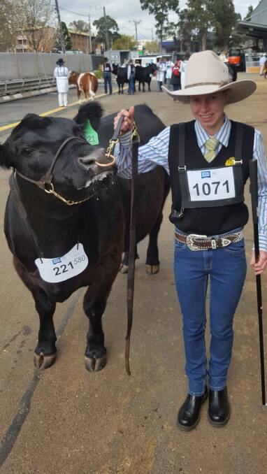 GRAND PLANS: Jess Oats with the outstanding Alpine Angus steer.