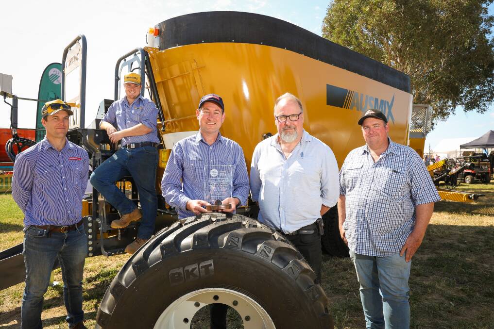 The fabulous FarmTech team ... (from left) Michael Giltrap, Liam Talbot, Brad Modra, Charlie Burder and Glenn Damm with the Greater Hume Council Award for Best Australian Designed and Manufactured Agricultural Machine. Picture supplied