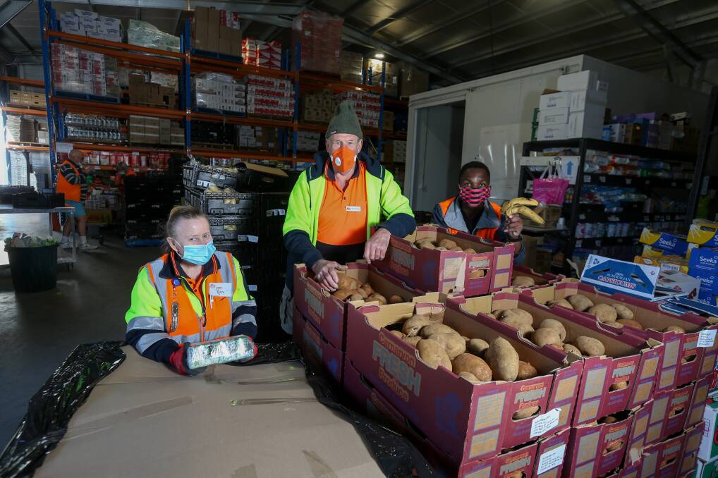 FRONT LINE SUPPORT: Albury-Wodonga Regional FoodShare volunteers Bev Campbell, Doug Gammon and Valentin Runanika; the organisation has received several significant funding injections to continue its critical work. Picture: TARA TREWHELLA