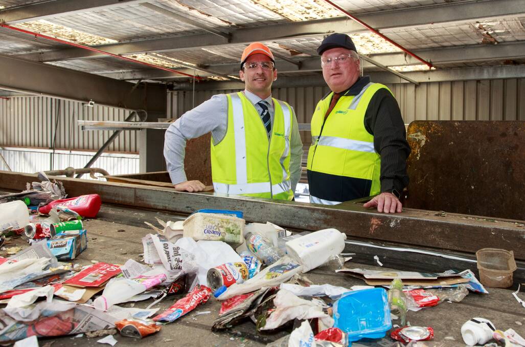 TRASH IS TREASURE: Cleanaway's Victorian general manager Clete Elms with regional manager Pat Beath. Picture: SIMON BAYLISS