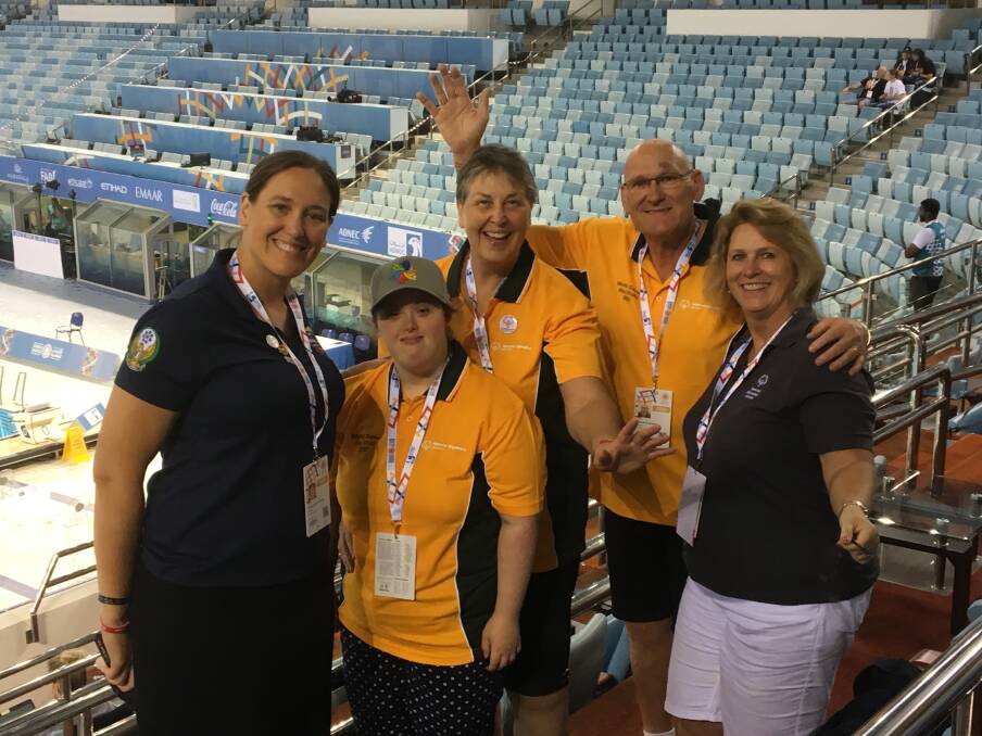 CHEER SQUAD: Nathan's family supporters Melanie (Castles-McKeown), Alannah, Judith and Alan McKeown at Dubai's Hamdan sports stadium pool with Corene Strauss, CEO of Special Olympics Australia. Pictures: SUPPLIED