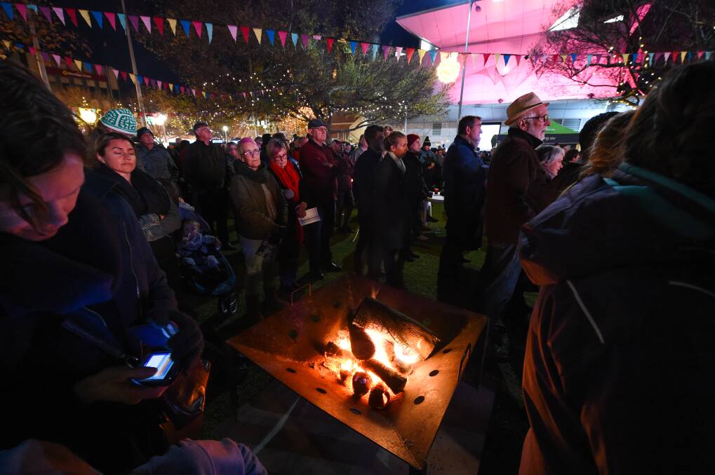 STANDING TOGETHER IN THE DARKNESS: The annual Albury-Wodonga Winter Solstice has become an important event on the community's calendar, lighting the way for people to speak and share the pain of loved ones lost to suicide and mental illness.