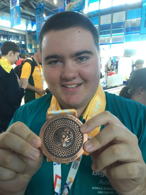 MEDAL MAN: Wodonga swimmer Nathan Pearce with his bronze medal in the relay at the Special Olympics; he also claimed an individual silver in breakstroke.