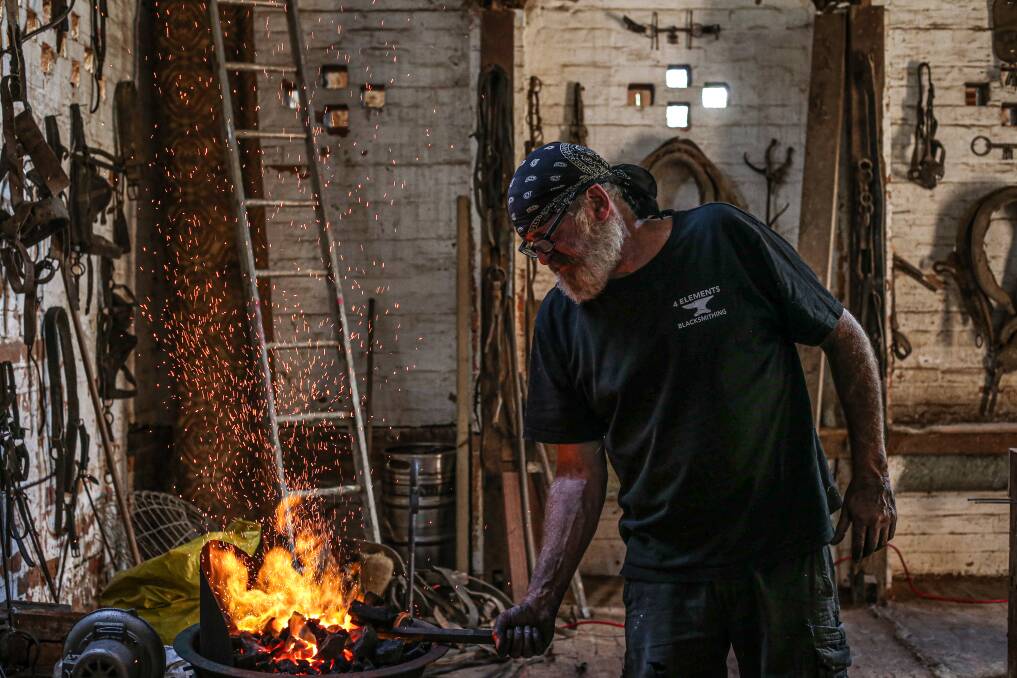 LOST IN THE FLAMES: Being a blacksmith 'is not a job', says Brendan.