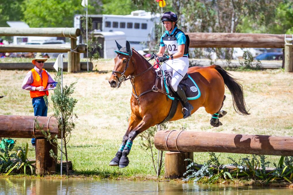 JUMP TO IT: EVA105B winner Kirilee Hosier on AEA Flynn into the water at the Albury-Wodonga International Horse Trials on the weekend of October 27 and 28. Picture: OneEyedFrog Photography