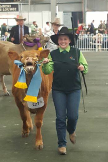 ROYALS: Hayley Webb with the winning Le Martres steer at Melbourne.