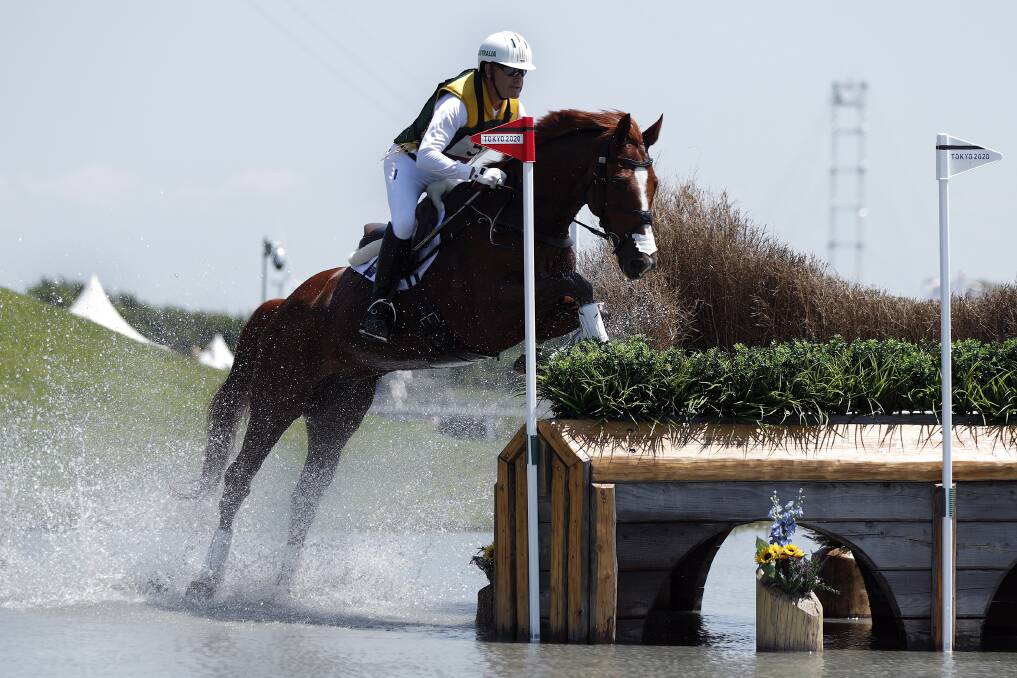 HISTORY IN THE MAKING: Culcairn born and raised Andrew Hoy aboard the French-bred chestnut gelding Vassily de Lassos during Sunday's cross-country phase of equestrian eventing at Tokyo ... the Aussie team went on to secure a silver medal while Hoy secured an individual bronze.