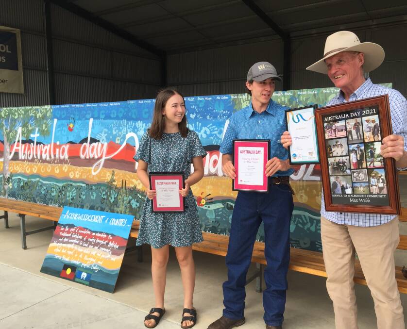 COMMUNITY-MINDED: Alexandra Toogood and Daniel Hawkins, joint winners of Greater Hume's Young Citizen of the Year, with Max Webb who was recognised for outstanding service to the Walbundrie community in front of the mural created by Jasmin Lieschke and Megan Coyle.