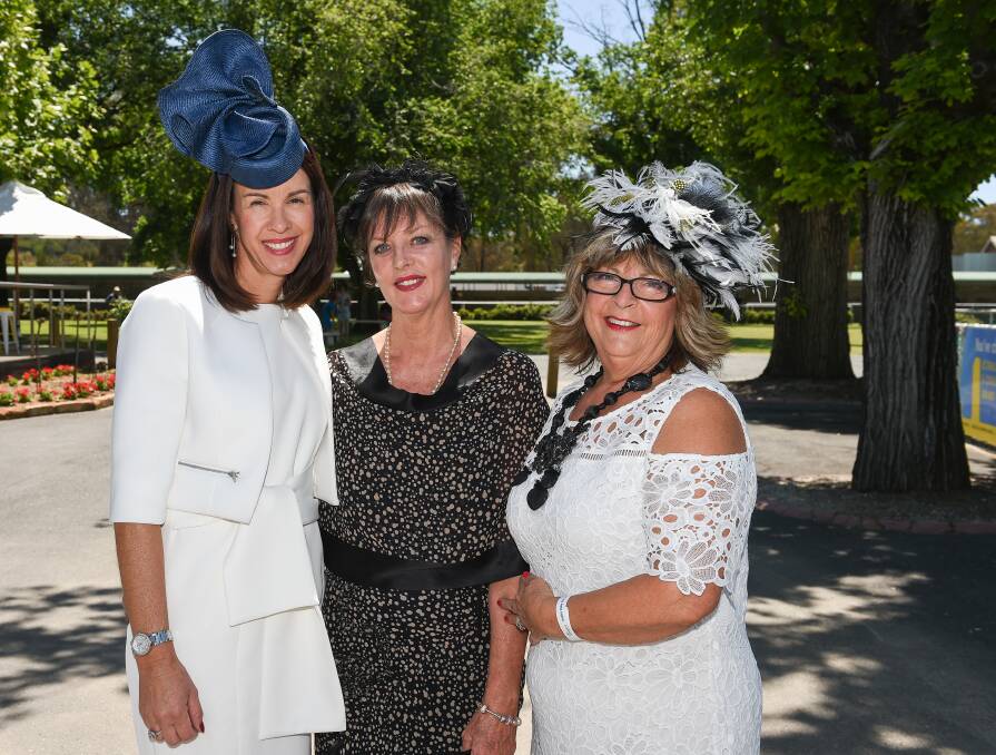 STYLE STAKES: Tracey Zauner, Deb Palmer and Aspire Oaks Day luncheon director Lizzie Pogson at the 2017 event, which supports the community grants scheme.