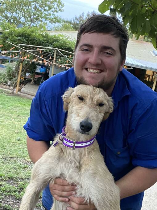 BELOVED SON: Sam Hill with Harley, one of his many favourite dogs. The Hill family is helping to organise a community event at Corryong to remember those loved and lost to suicide and reflect on the challenges faced by the Upper Murray in recent years. Picture: SUPPLIED