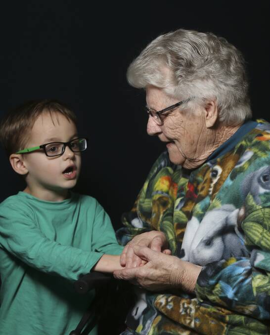 GETTING TO KNOW YOU: Alexander Stephens, 5, from Goodstart Early Learning Albury, finds a willing audience in Daphne Ellison, 82, during a visit to Dellacourt Lutheran Aged Care in West Albury. Pictures: Elenor Tedenborg