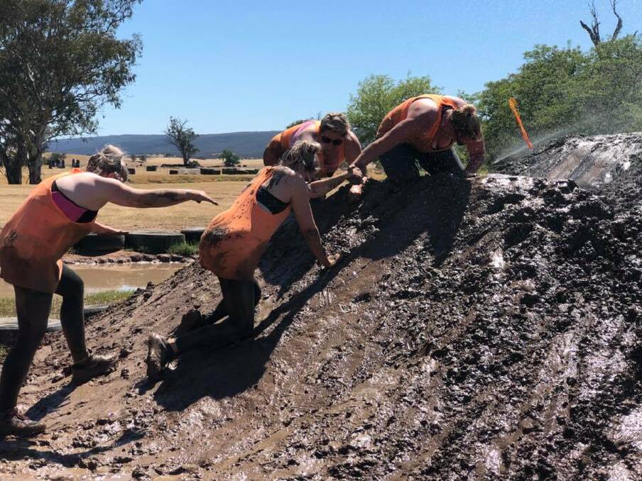 HELPING HAND: Camaraderie was the name of the game at The Mountain Warriors 2018 event on Saturday.