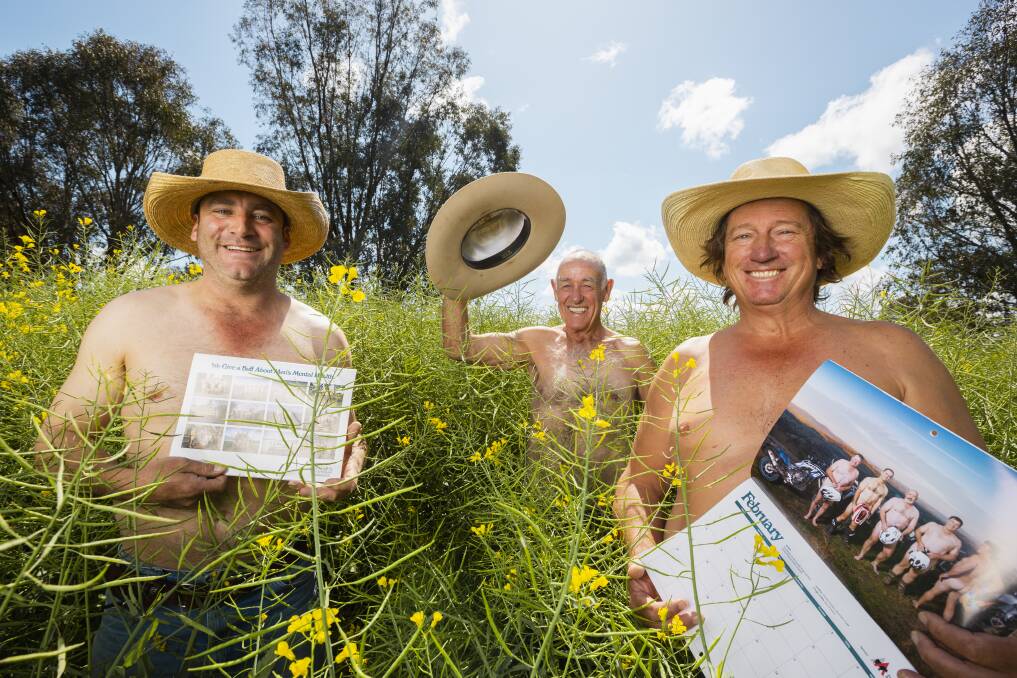 Hats off to a good cause ... Lachie Snow, Ben Simpson and Dick Shanahan celebrate the launch of the 2023 Hume Hunks & Hotties calendar in October 2022; the fundraiser has gone on to raise more than $80,000 for men's mental health and suicide prevention. Pictures by Ash Smith