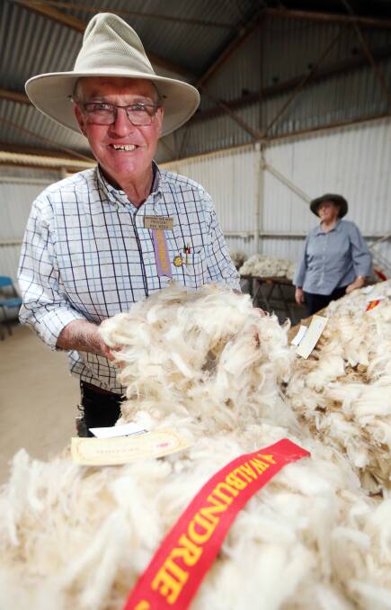 FINE FLEECES: Max Webb, pictured at the Walbundrie Show in 2014 with the winning fleece ... Max loved his sheep and was proud of his own wool that he produced.
