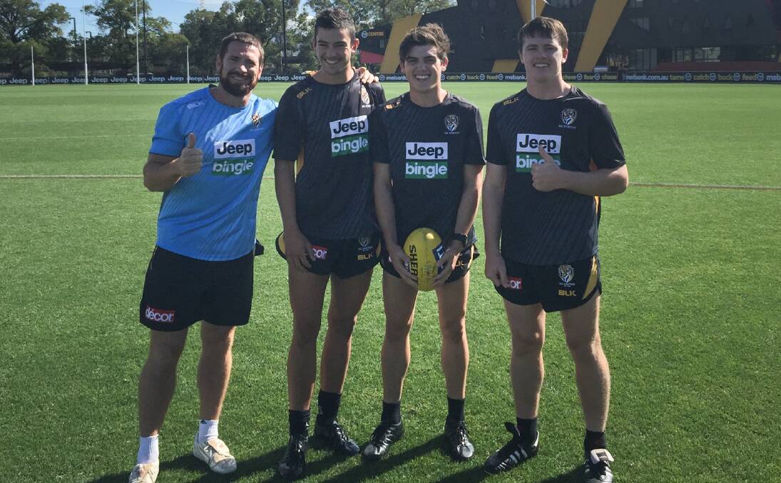Former North Albury coach Jason Akermanis with Lachie Taylor-Nugent, Shaun Mannagh and Dom Brew at Punt Road in 2016.