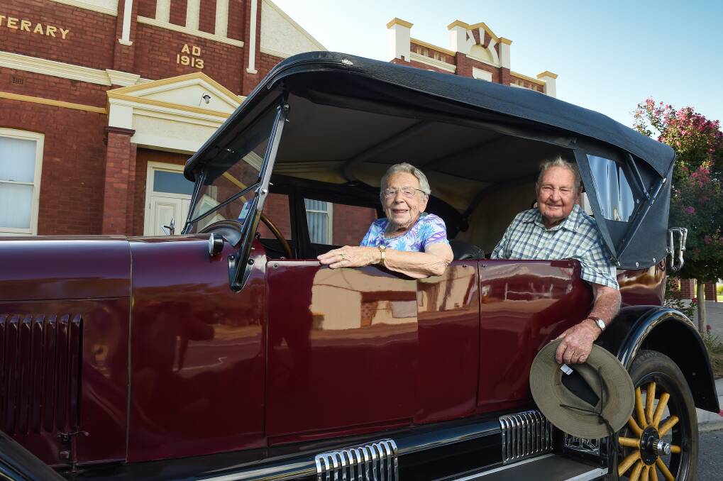 HAPPY DAYS: Gloria Feuerherdt and Ron Wiesner test out a 1925 Chev before Walla's 150th anniversary celebrations. Picture: MARK JESSER