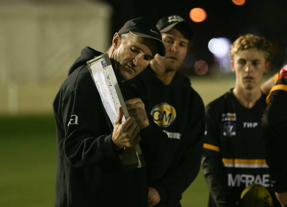 Jon Henry talks tactics before this year's inter-league loss to Mornington Peninsula Nepean. He has stepped down after four years.
