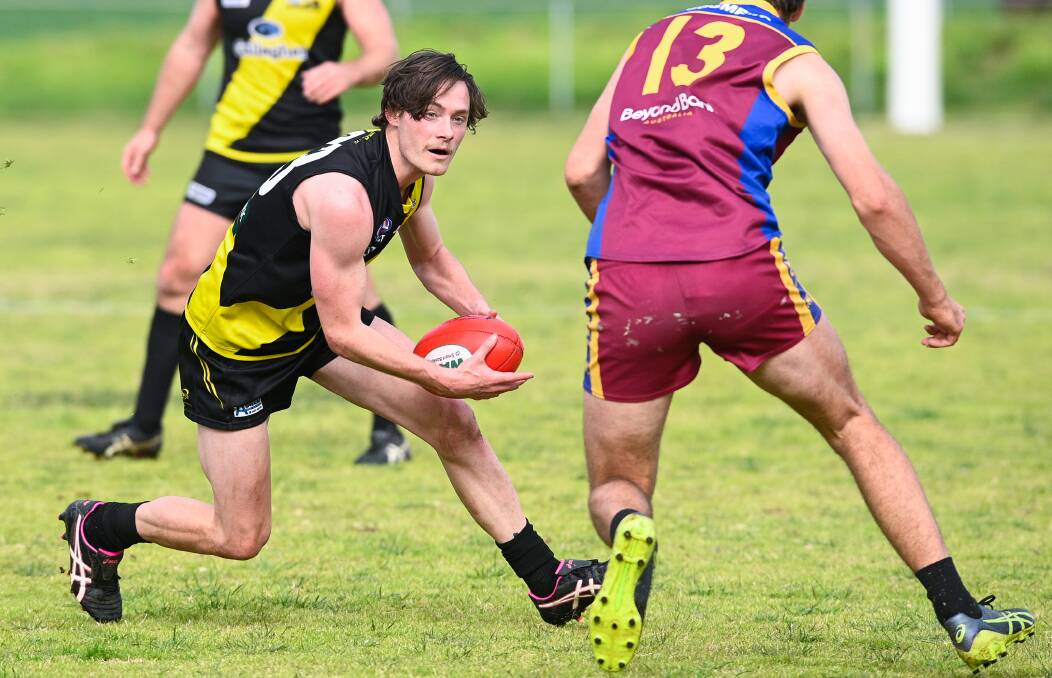 Star Osborne forward Connor Galvin evades a tackle against Ganmain in a practice match at Osborne last weekend. Picture: MARK JESSER