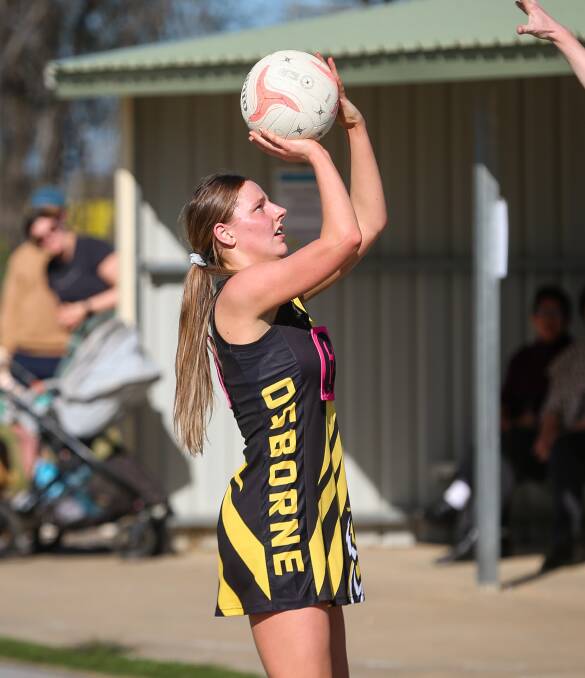 Young shooter Abbey O'Connell takes aim during a tight final round clash against Wagga Tigers at Osborne on Saturday. 