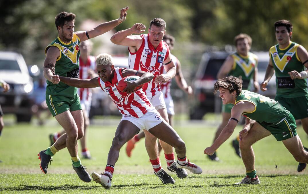 Henty's Zorran Bin Busu, previously known as Daniel Cox, was one of the Swampies' best against Holbrook on Saturday. Picture: JAMES WILTSHIRE