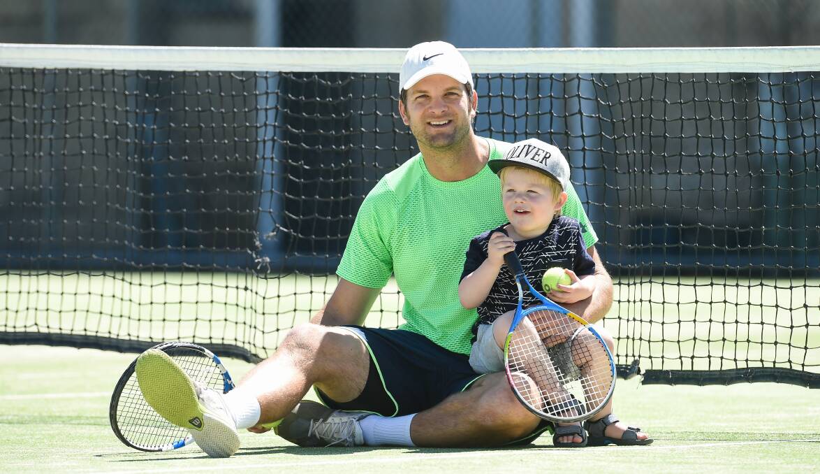 Forrest Hill Blues' player Nicholas Vicary and his son, Oliver, 3, are looking forward to a big season of Albury Tennis Association pennant action. Picture: MARK JESSER