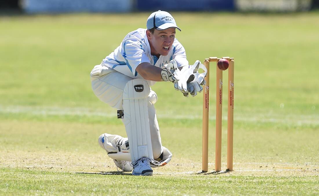Holbrook and District wicketkeeper Luke Richardson in action against Wagga in their O'Farrell Cup match on Sunday. Picture: MARK JESSER