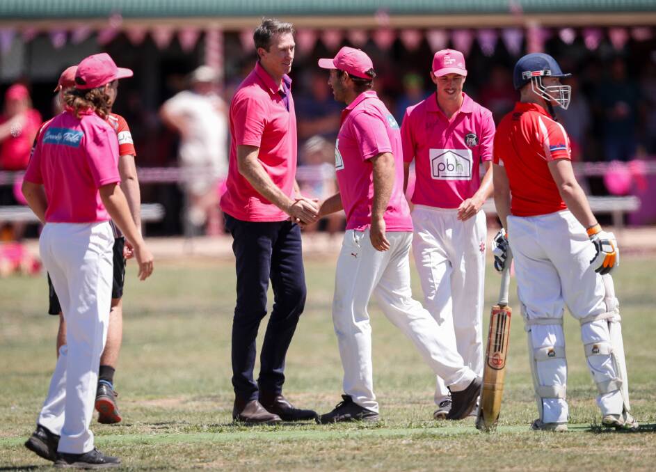 Former Test cricketer Glenn McGrath spent some time in the middle after bowling an over for Walbundrie against Henty. Picture: JAMES WILTSHIRE