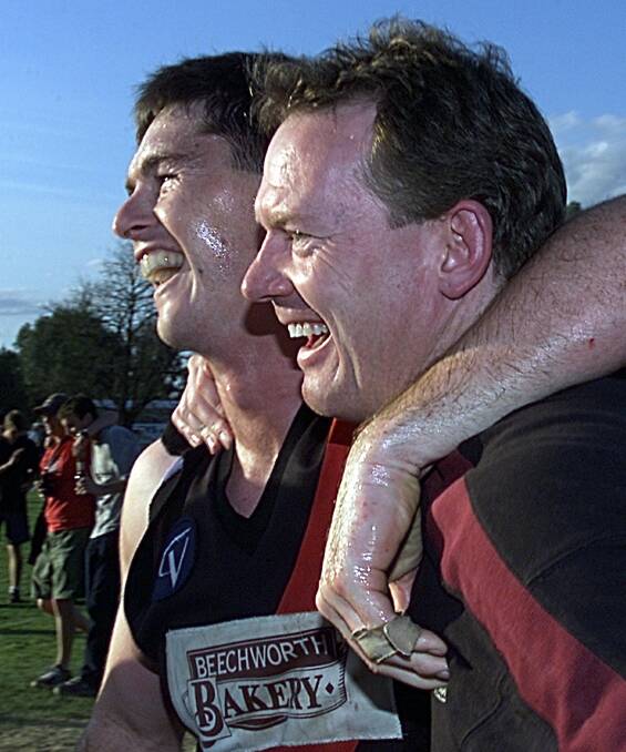 Brendan Breen and Michael Quirk celebrate Beechworth's 2001 grand final win over North Wangaratta.