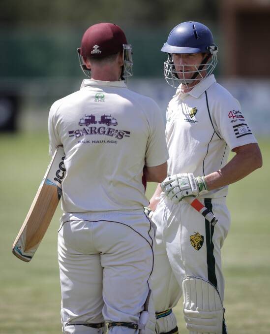 CAW batsmen Jack Craig and Brendan Simmons talk tactics during last weekend's 109-run victory over Holbrook. Picture: JAMES WILTSHIRE