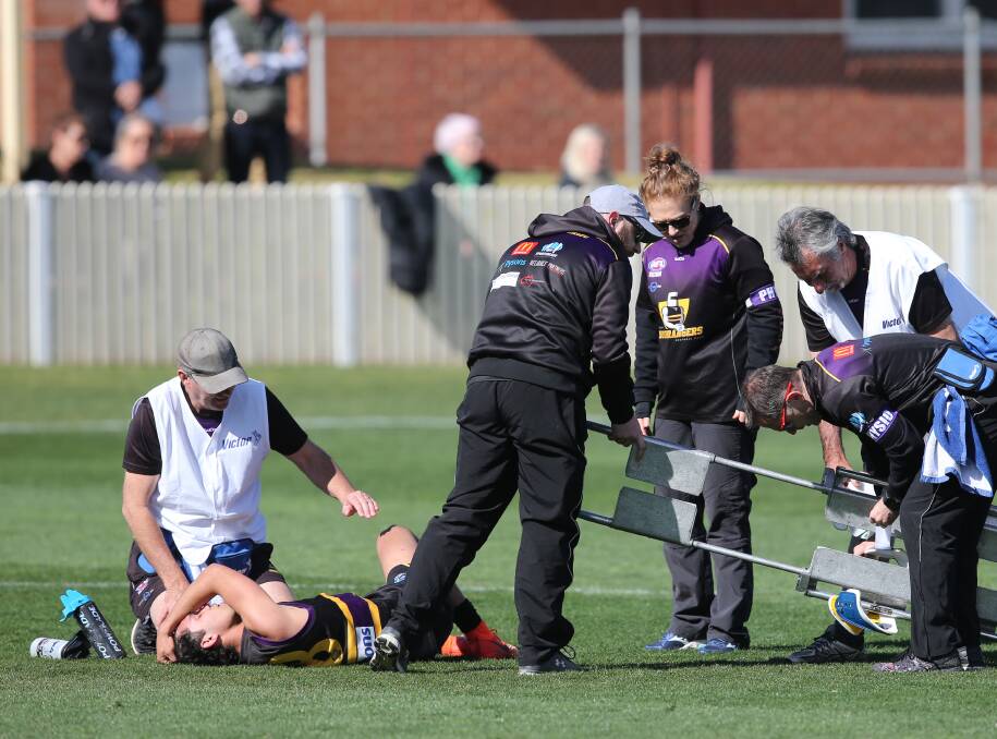 Co-captain Kyle Clarke went down with a suspected ACL injury during the second quarter.