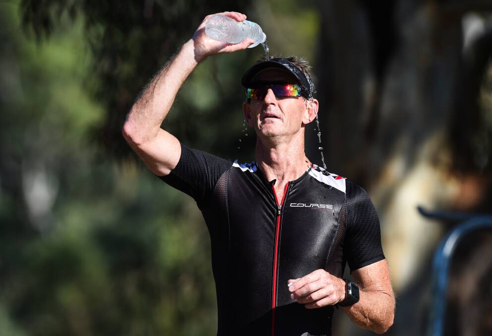 HARD WORK: Damian Gillard on his way to victory in the sprint triathlon. He has put his injury problems behind him and is keen to contest an ironman event. Pictures: MARK JESSER