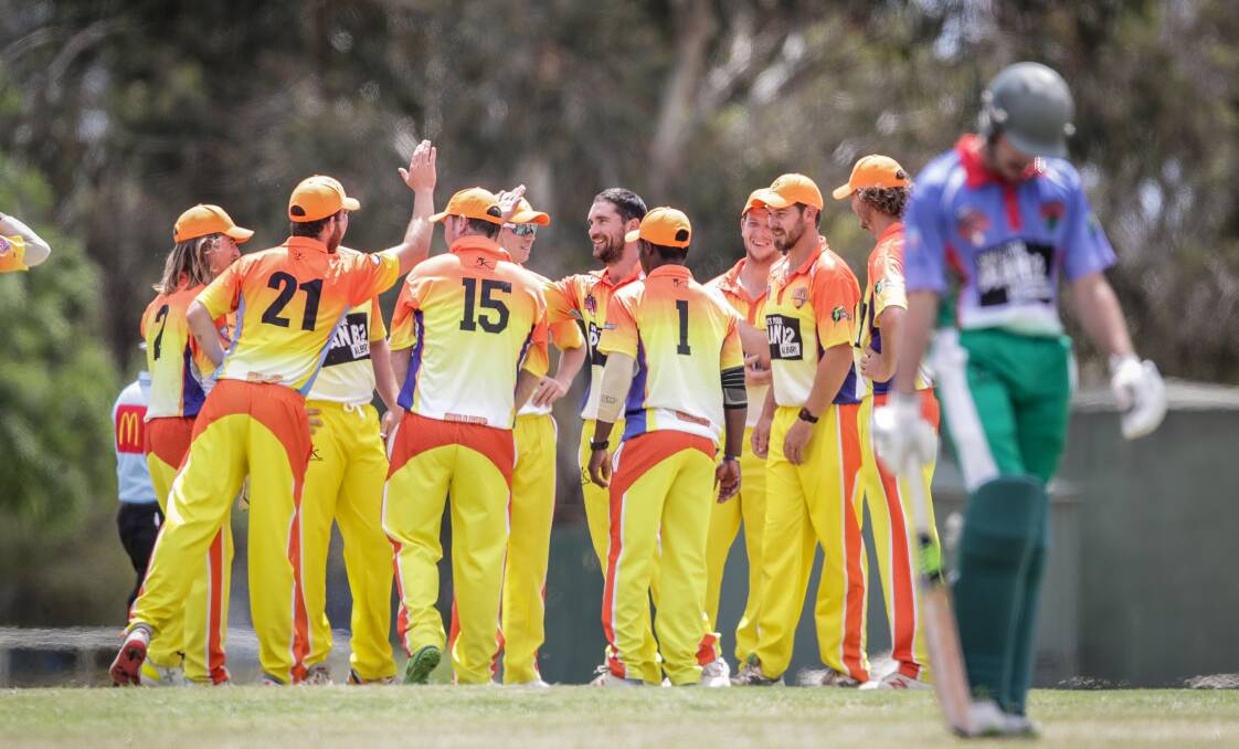 The Bullets celebrate a Ryan Brown wicket. Picture: JAMES WILTSHIRE