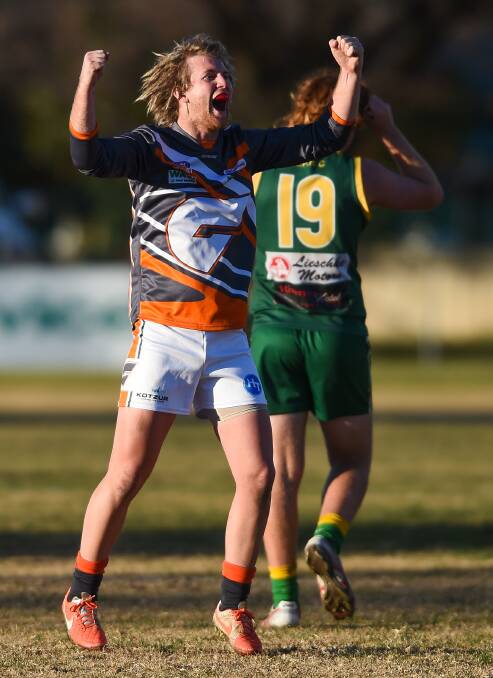 MAGICAL MOMENT: Rand-Walbundrie-Walla's Dylan Weeding celebrates the Giants' two-point win over Holbrook at Holbrook on Saturday. Pictures: MARK JESSER