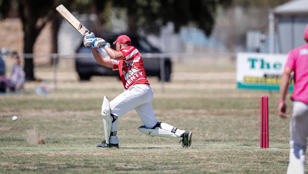 Greg Schuller hammers a ball through the covers during Henty's narrow loss to Walbundrie. He kept the Swampies in the game with a half-century.