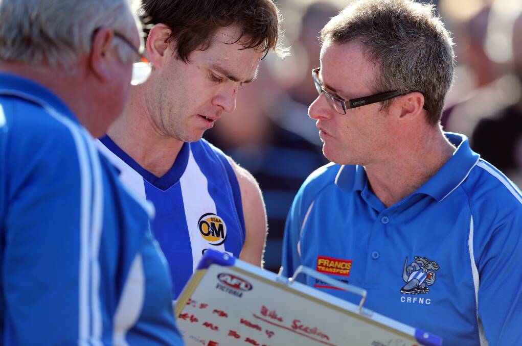 Troy Maiden, pictured with Bryce Campbell at Corowa-Rutherglen in 2014, is looking forward to reacquainting himself with Osborne as coach of Wagga Tigers. 