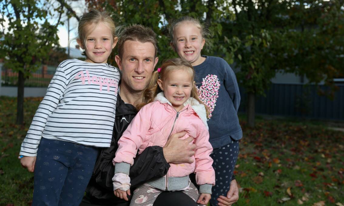 Chris Hyde with his daughters Eliza, Madeline and Charlotte.