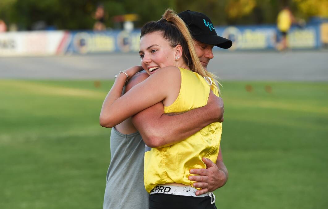JOB WELL DONE: Gabbie Boulton is congratulated by her father, Jason, after taking out the women's gift final on Saturday. Pictures: MARK JESSER