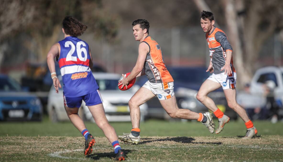 Chris Duck charges forward for the Giants last weekend.