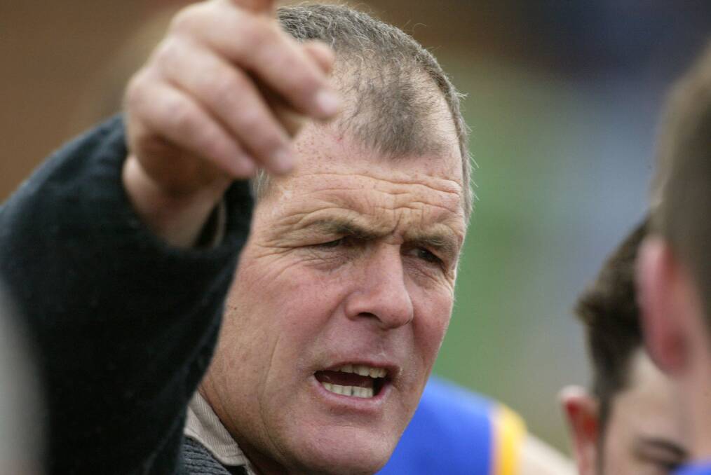 Coach Hugh Giltrap calls the shots for the Tallangatta and District eague against Benalla at Birallee Park in 2004.