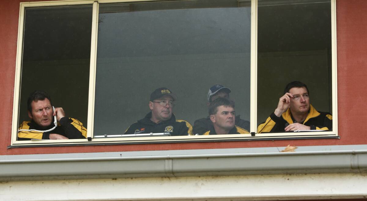 Mark Turner, Ross Ried, Tim Scott and Tom McGrath in the Albury coaching box in 2010.