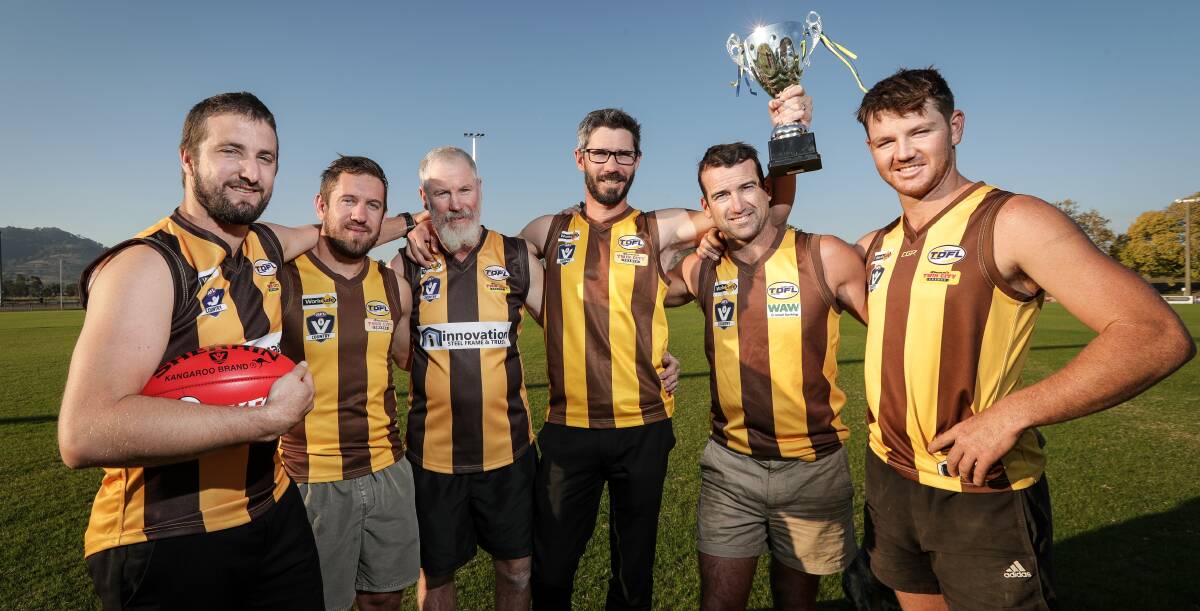 Cal Turner, Scott Bartel, Robbie Barber, Ash Sutherland, Travis Knight and Tim Kindellan before a 2008 premiership reunion. The Hawks defeated Dederang-Mt Beauty by 34 points that season.